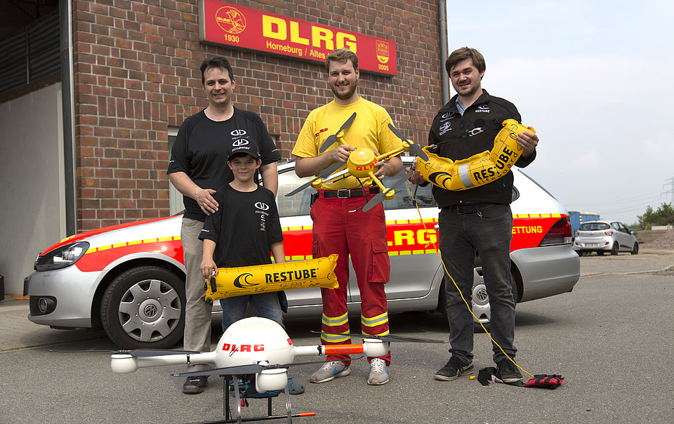 Company's officials displaying the live saving drone / Image Source: Microdrone